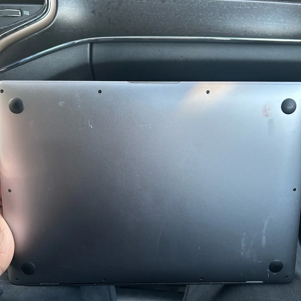 Mac book, will cost $450 to fix do to minor damage but still useable.